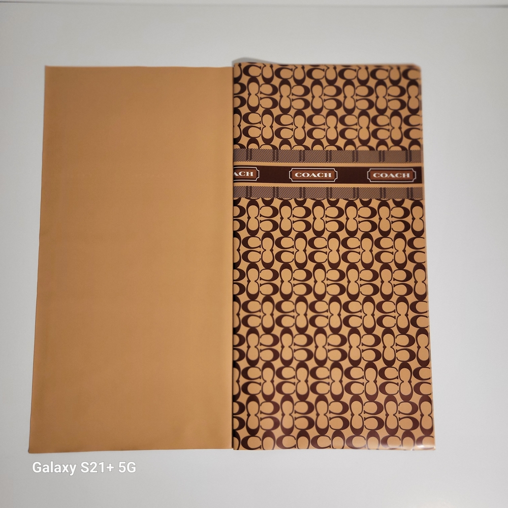 Coach Signature Brown and Tan Paper